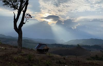 Scenic view of mountains against sky during sunset