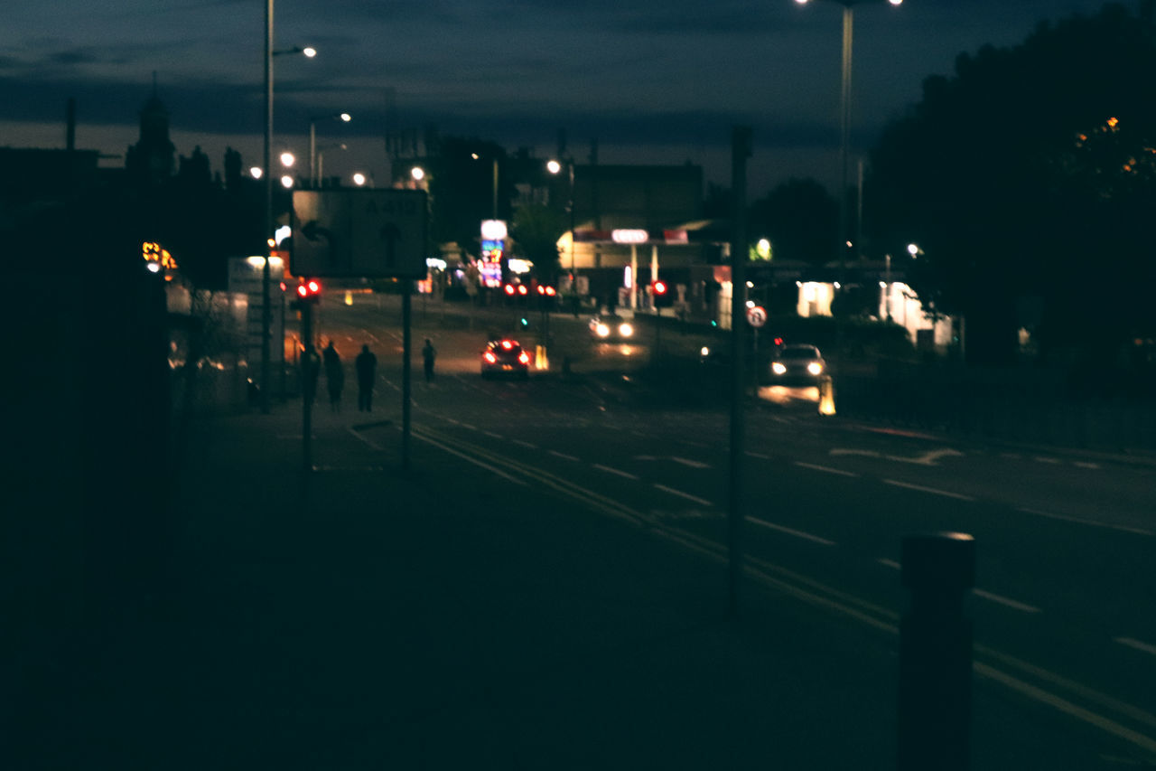 CARS ON ROAD AT NIGHT