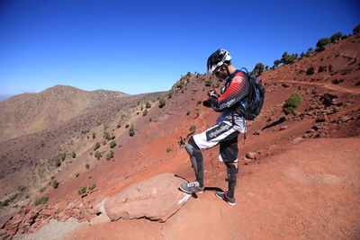 Full length of woman on mountain landscape