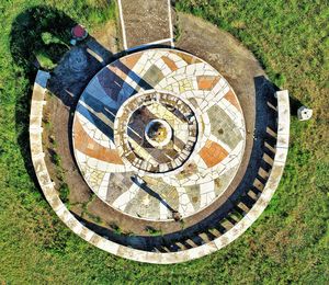 High angle view of spiral staircase on field