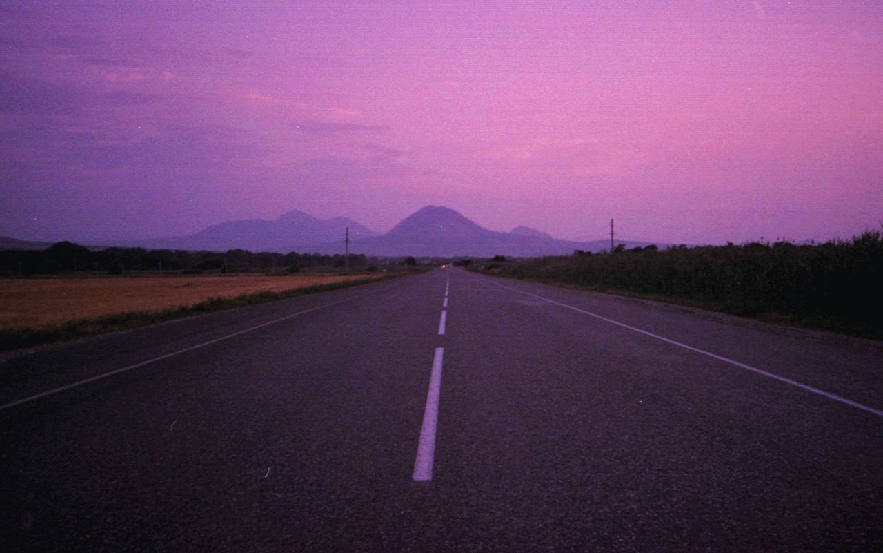 road, the way forward, road marking, transportation, asphalt, white line, mountain, no people, landscape, nature, outdoors, tranquil scene, scenics, dividing line, tranquility, beauty in nature, sky, day, clear sky