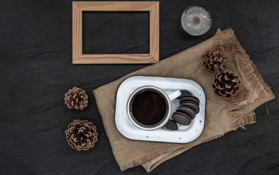 High angle view of coffee cup on table