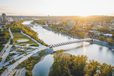 High angle view of river amidst buildings in city