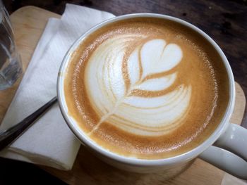 High angle view of cappuccino on table