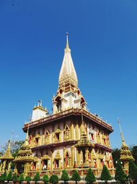 Low angle view of cathedral against blue sky