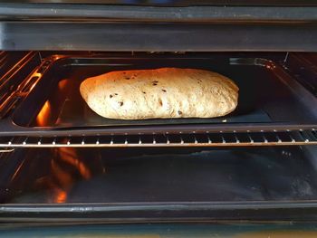 High angle view of bread on barbecue grill