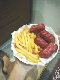 Close-up of hand holding food