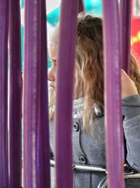 Close-up of woman wearing multi colored curtain