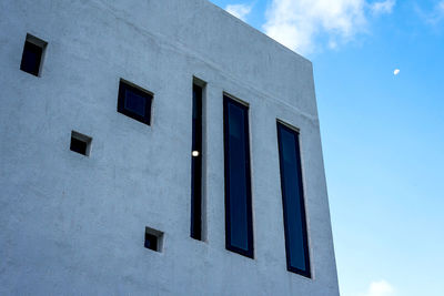 Low angle view of building against blue sky