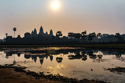 Panoramic view of lake against sky during sunset