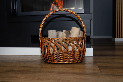 Close-up of wicker basket on table