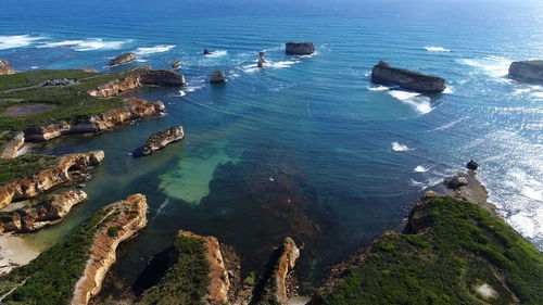 High angle view of rocks and sea