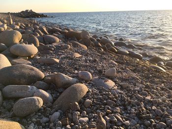 Stones on shore at beach