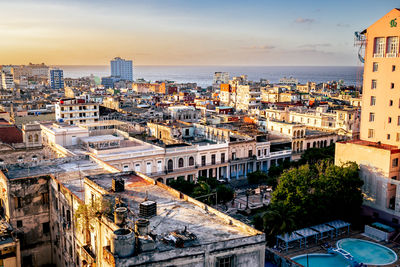 High angle view of cityscape, havana rooftops at sunset