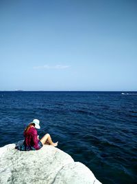 Rear view of woman on beach