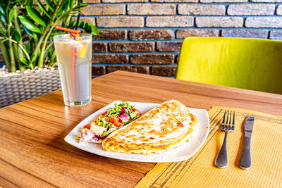 Close-up of breakfast served on table