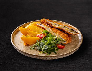 Close-up of food in plate on table