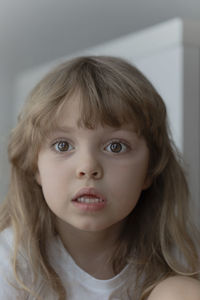 Portrait of surprised girl