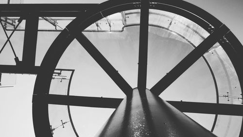 Close-up of clock against sky