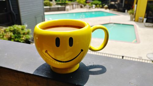 Close-up of yellow and swimming pool