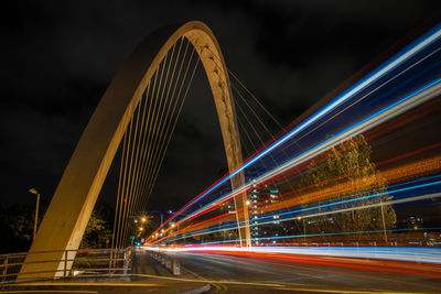 Light trails on bridge at night