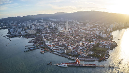 High angle view of river amidst buildings in city