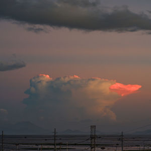 Scenic view of dramatic sky during sunset