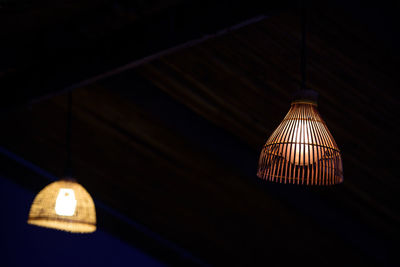 Low angle view of illuminated pendant light