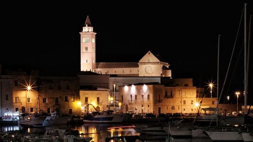 Illuminated buildings in city at night