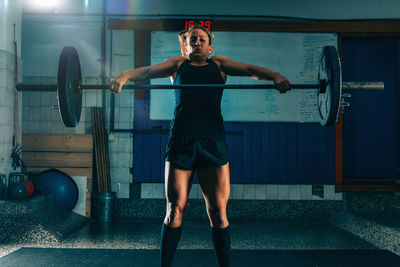 Woman exercising at gym 