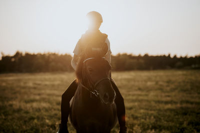 Girl horse riding