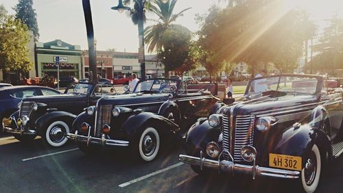 Cars parked on road in city