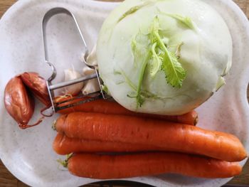 High angle view of vegetables in plate on table