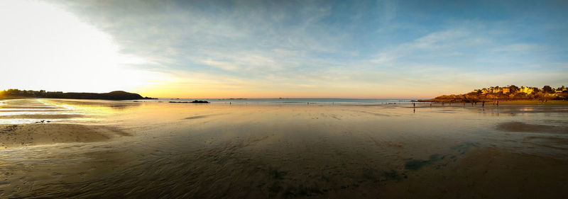 Scenic view of beach during sunset