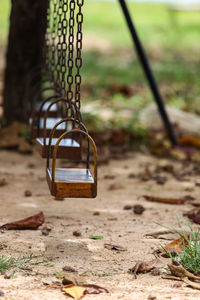 Close-up of swing in park