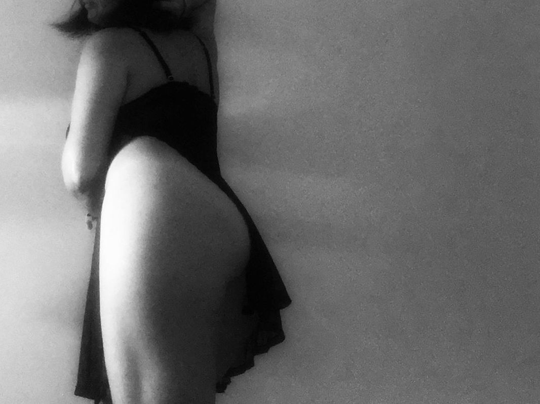 black and white, black, one person, monochrome photography, white, hand, women, adult, monochrome, finger, indoors, underwear, clothing, young adult, wall - building feature, limb, photo shoot, lingerie, female, rear view, person, standing, lifestyles, back, arm, three quarter length, human leg, midsection, hairstyle, panties