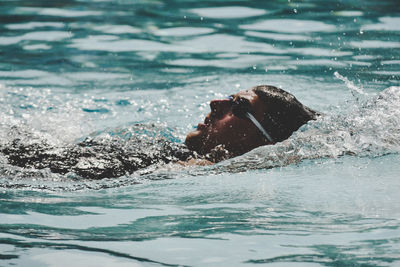 Man swimming in sea