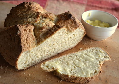 Close-up of bread and butter on table
