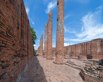 View of old ruin building against cloudy sky