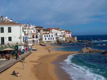 View of beach against cloudy sky