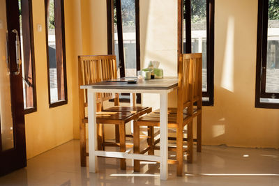 Empty chairs and table at home