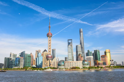 View of buildings in city against sky