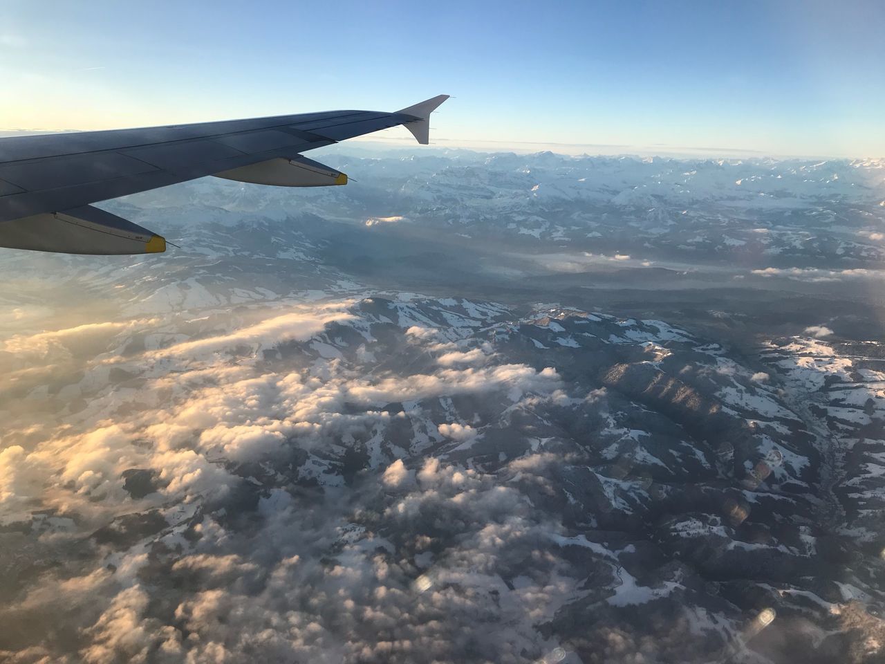 airplane, aerial view, transportation, airplane wing, nature, sky, flying, cloud - sky, journey, mid-air, beauty in nature, no people, aircraft wing, air vehicle, travel, scenics, tranquil scene, outdoors, tranquility, day, sunset