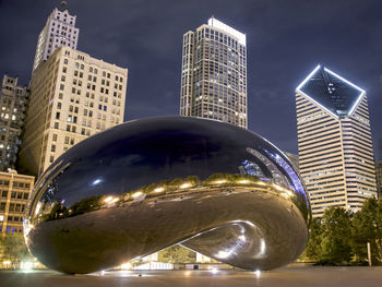 Modern skyscrapers lit up at night