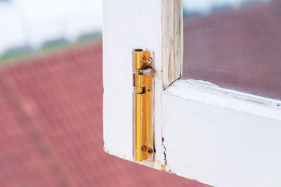 Close-up of open door of building