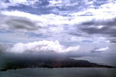 Scenic view of sea against cloudy sky