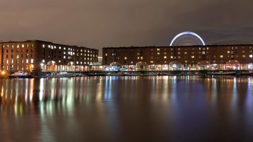 Illuminated buildings in city at night