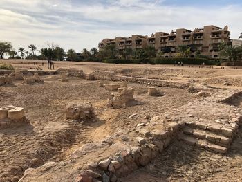 View of old ruin building against cloudy sky