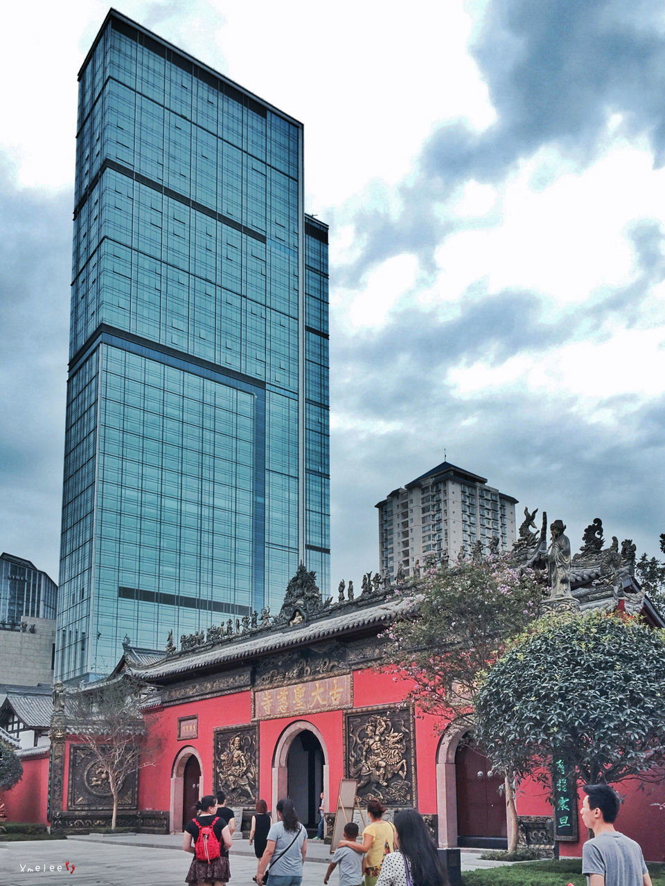 building exterior, architecture, built structure, city, sky, cloud - sky, city life, modern, office building, skyscraper, men, cloud, building, street, cloudy, tower, tall - high, large group of people, day