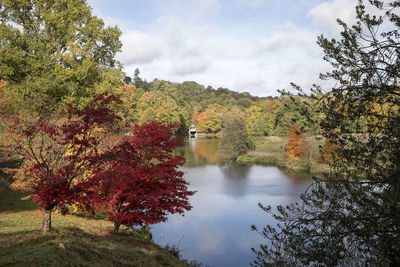 Scenic view of lake against sky during autumn